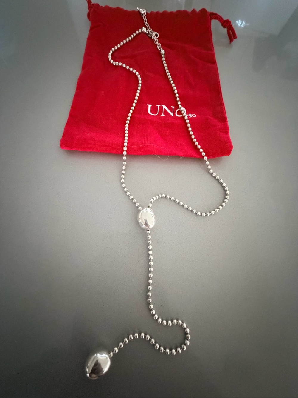 UNO de 50 Silver Beaded Lariat Necklace with Red Pouch
